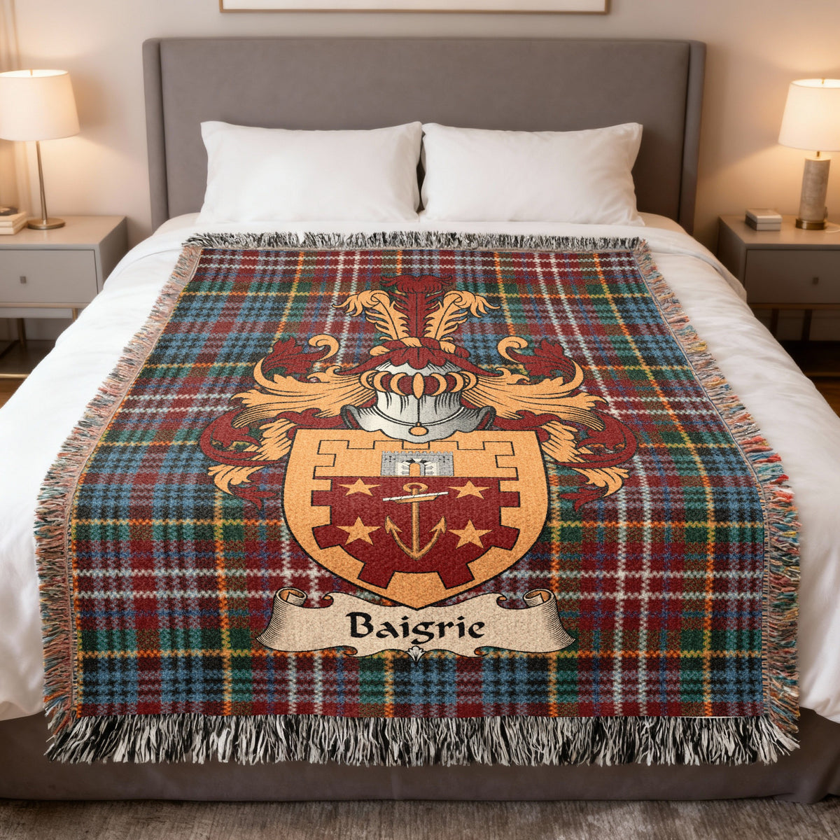 Baigrie family crest emblem on a Caledonia tartan woven blanket