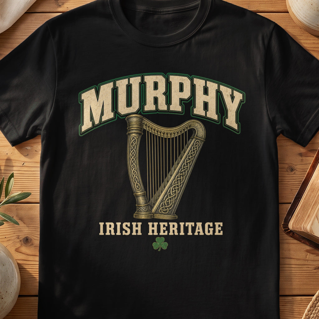 Murphy Irish harp T-shirt in Black, with cream surname lettering, a gold-toned harp, green shamrock and “Irish Heritage” text.