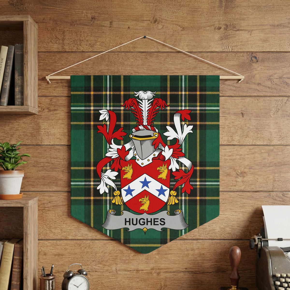Hughes family crest banner on green tartan with helmet, crest, and motto.