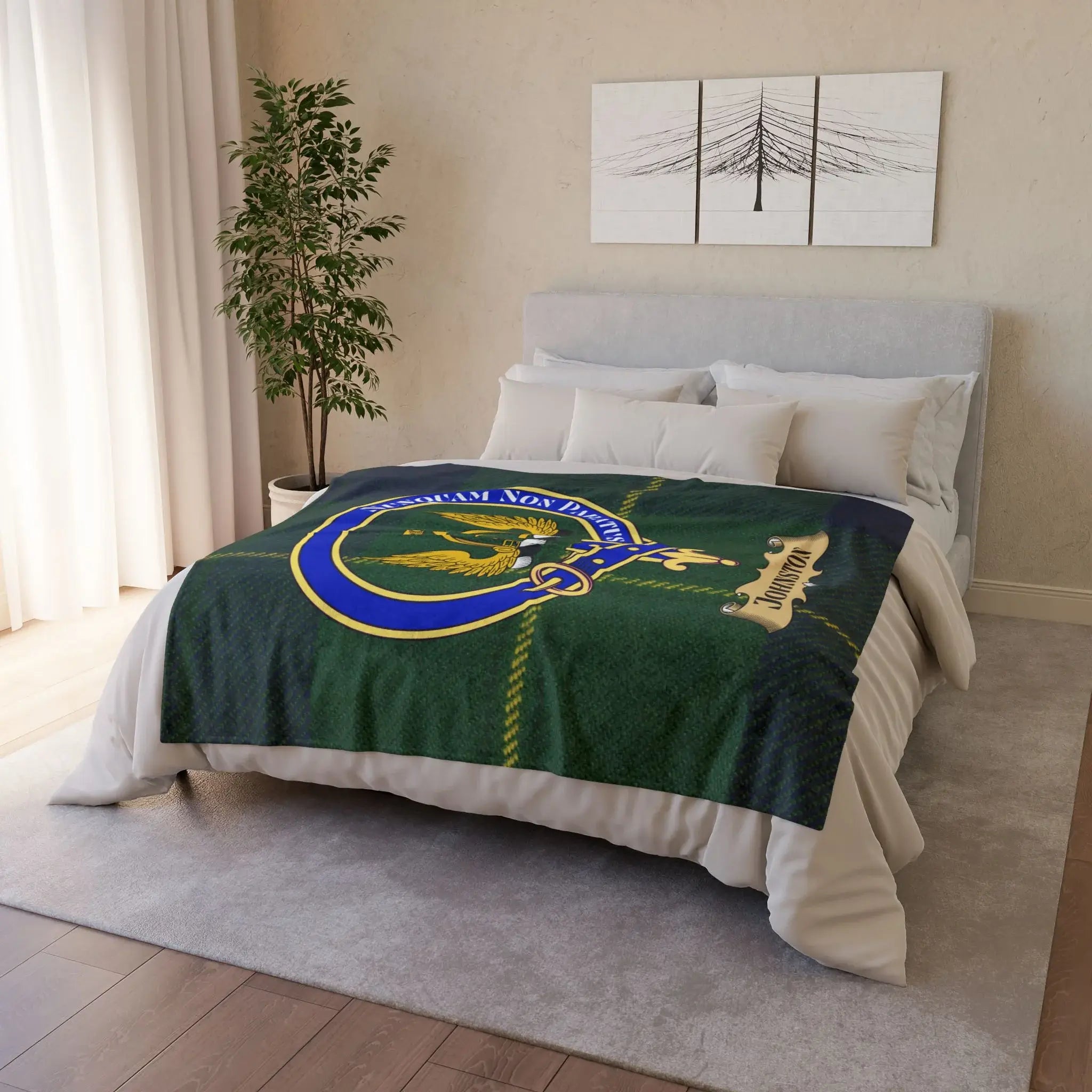 Johnston clan tartan throw blanket on bed — green tartan with clan crest and Never Unprepared motto