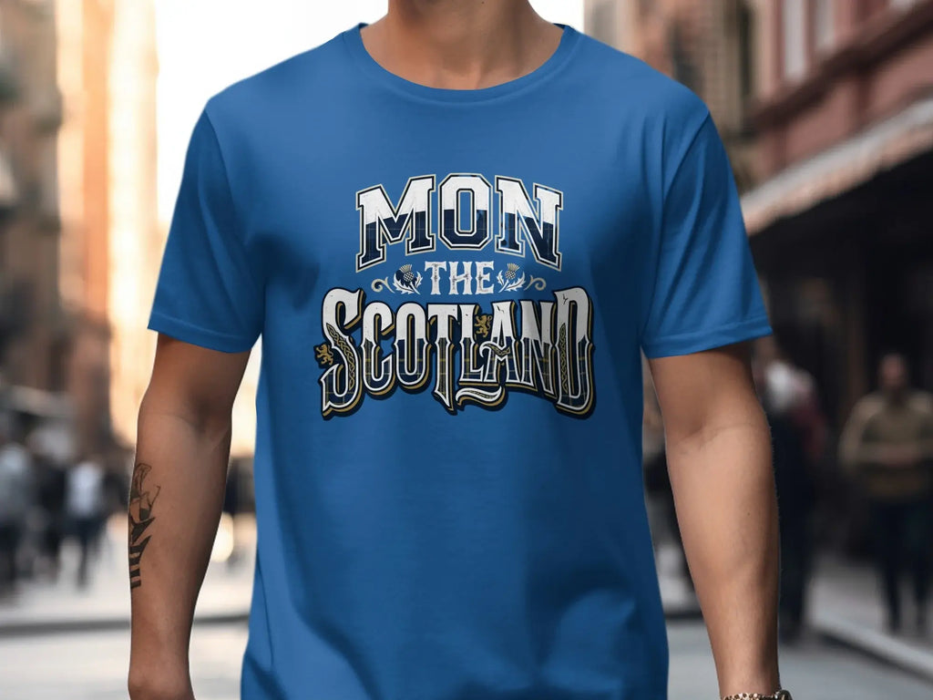 Blue t-shirt with "MON THE SCOTLAND" text in distressed collegiate style.