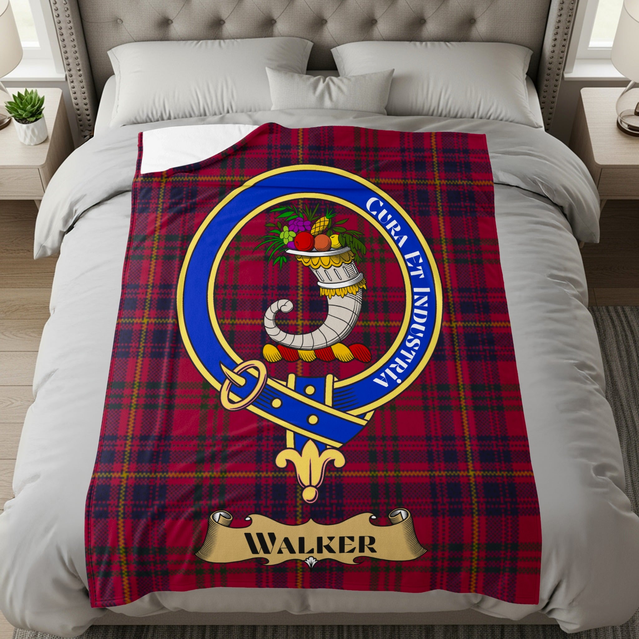 Walker clan crest with Cura et Industria motto on red tartan throw