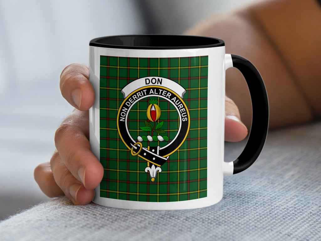 Don Scottish surname crest artwork on an 11 oz black accent mug with a tartan background