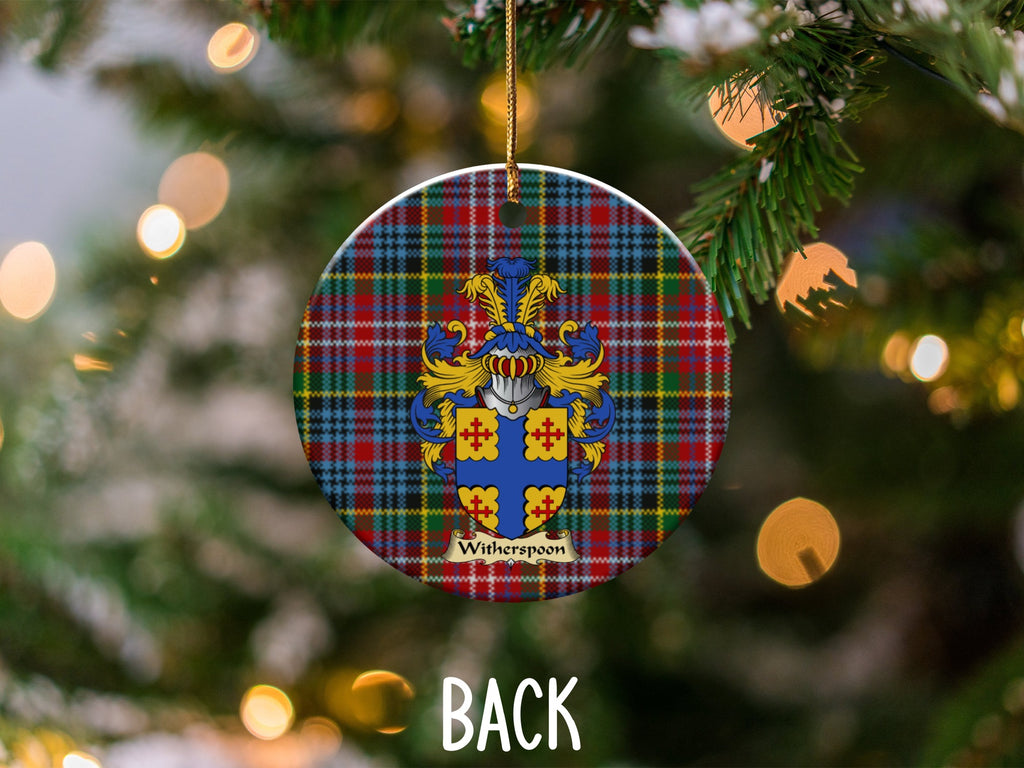 Witherspoon ceramic ornament detail showing a double-sided family shield on a Caledonia tartan background