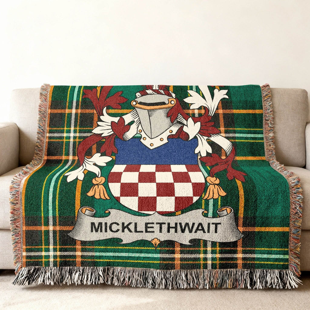 Tartan throw blanket with Micklethwait family crest.