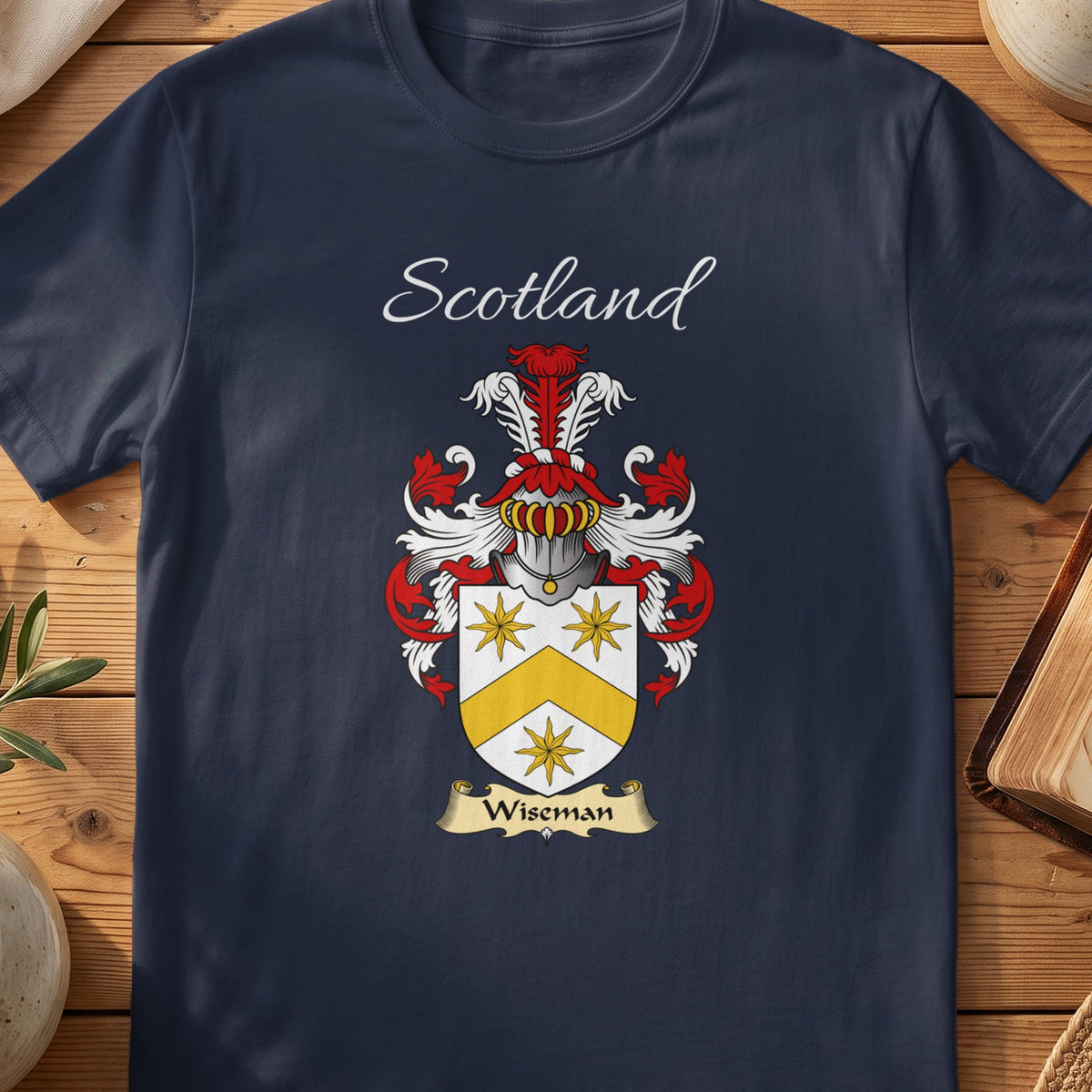 Navy Wiseman heritage T-shirt laid flat with “Scotland” and the colourful family shield design.