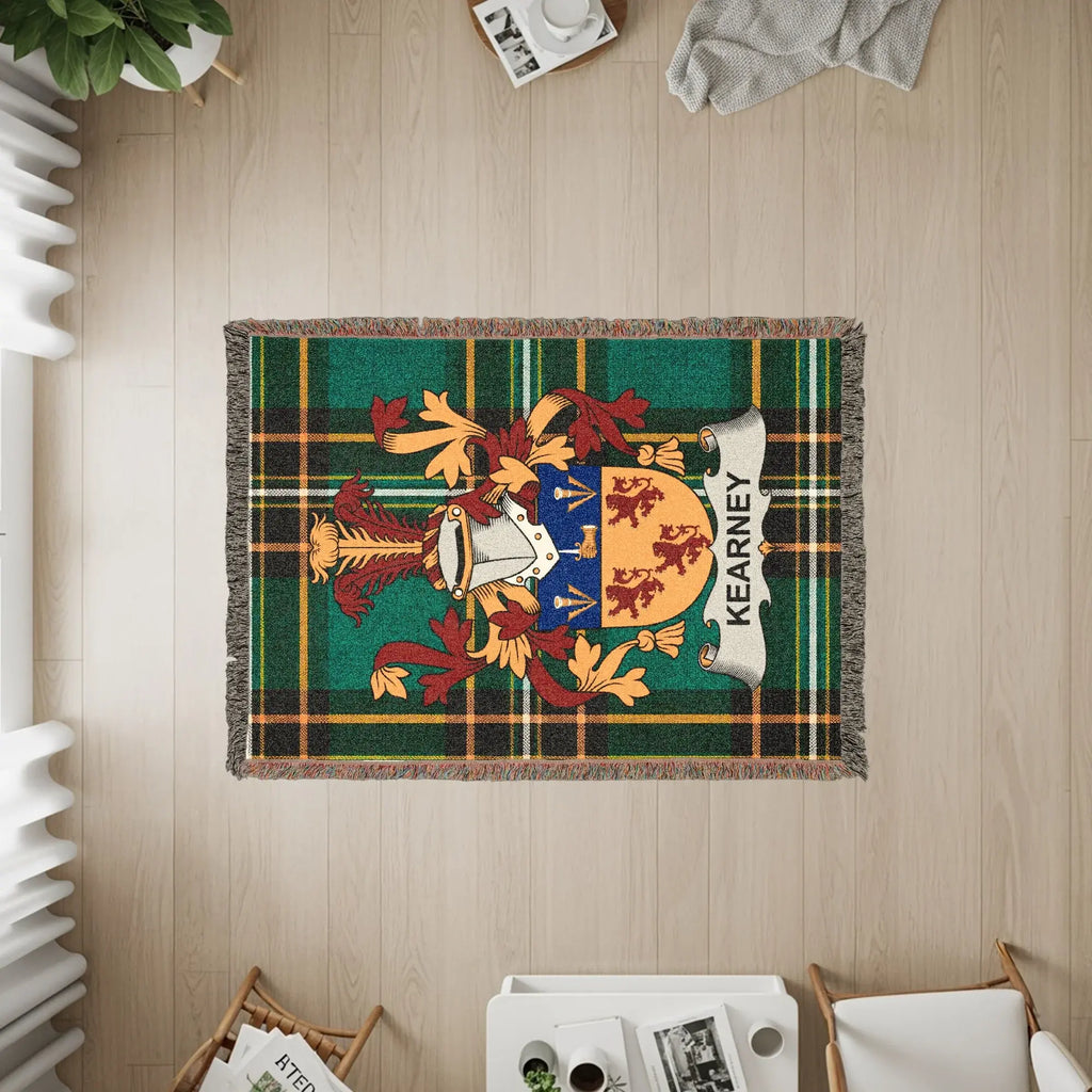 Kearney family crest on a tartan plaid woven blanket with fringe.