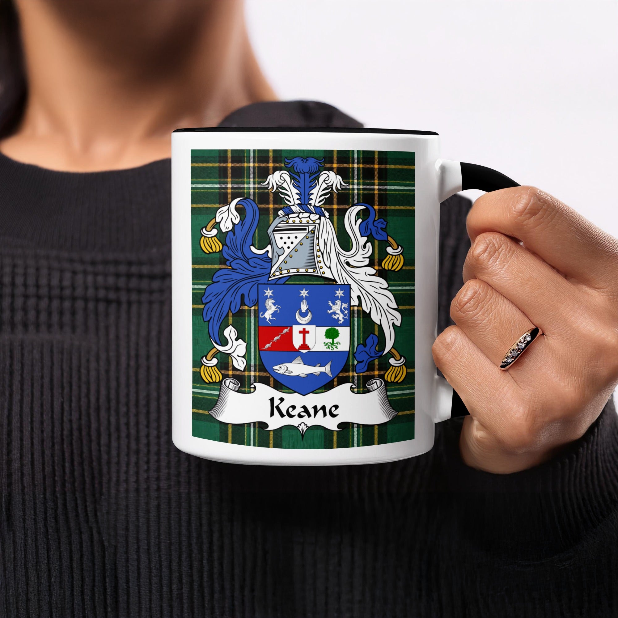 Keane Irish family crest on green tartan mug — close-up detail