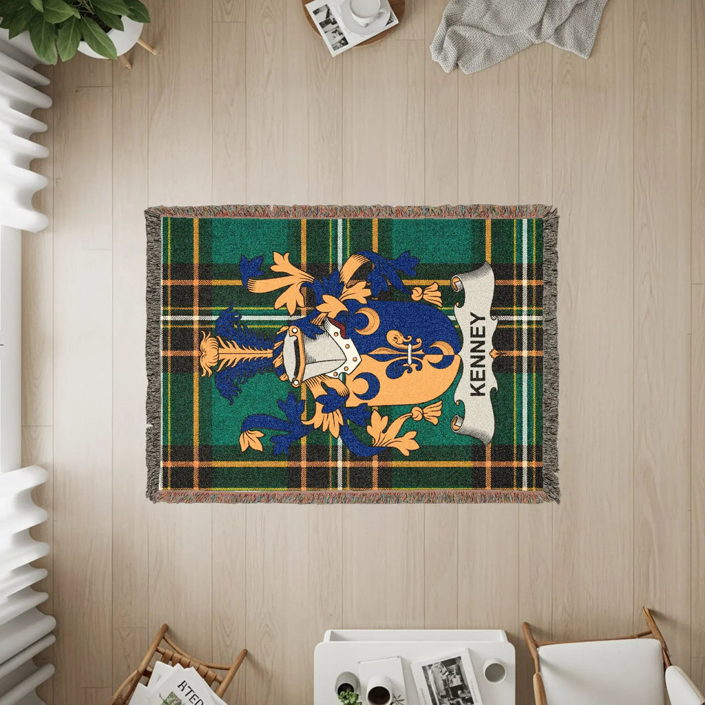Kenne family crest on a woven plaid throw blanket.