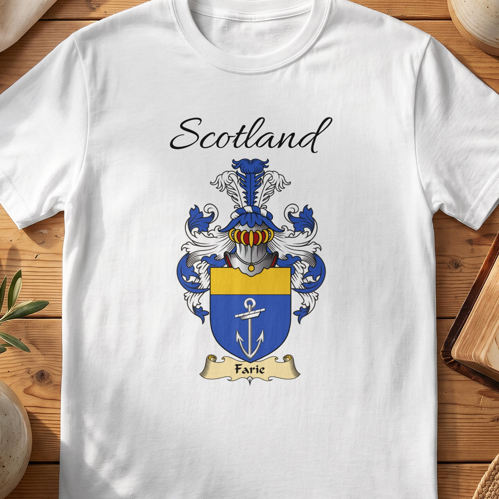 White Farie Scottish family shield T-shirt featuring a white anchor on blue beneath a gold top band