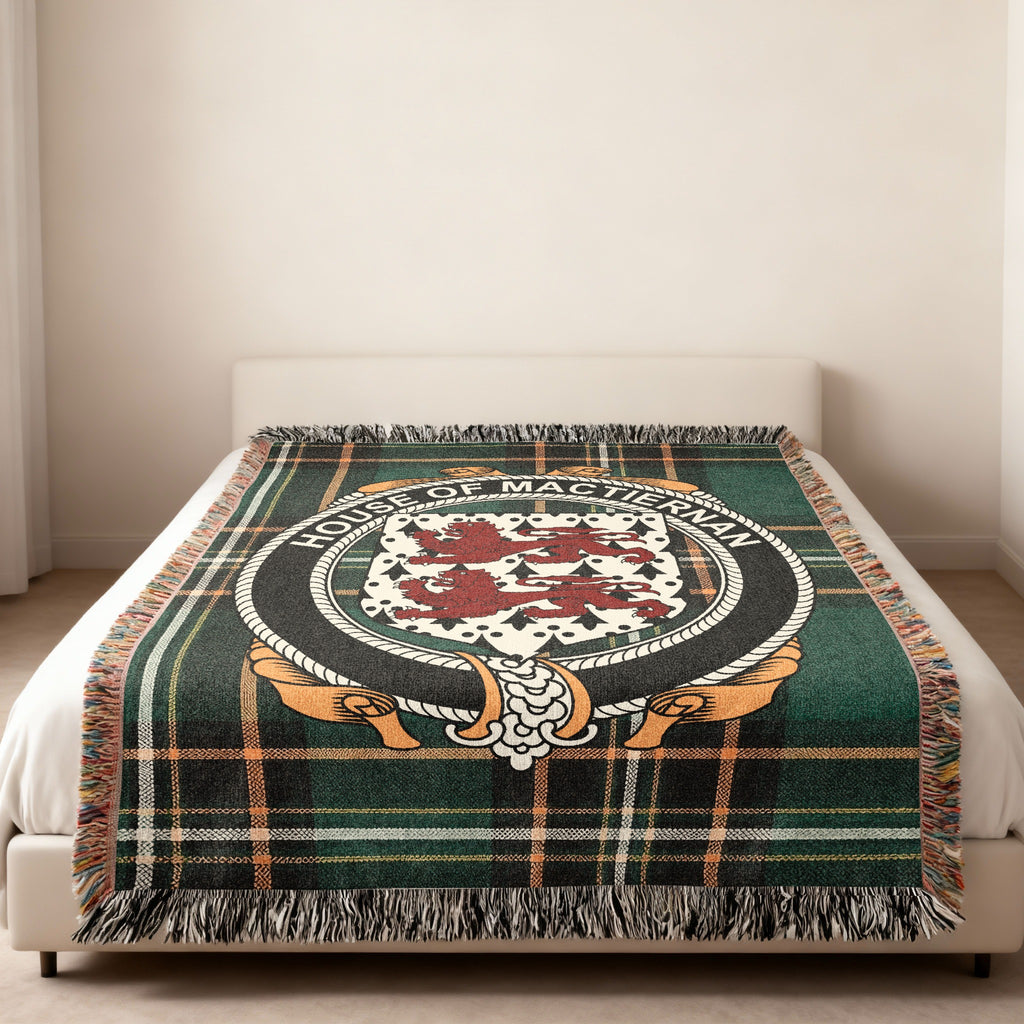 MacTiernan family crest emblem woven blanket displayed on a bed
