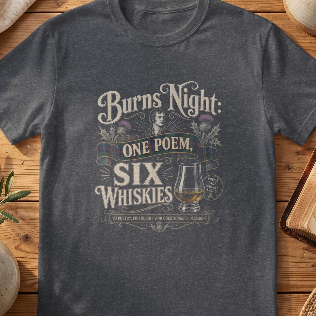 Dark grey Gildan 64000 unisex T-shirt flatlay with Burns Night One Poem Six Whiskies Scottish graphic design