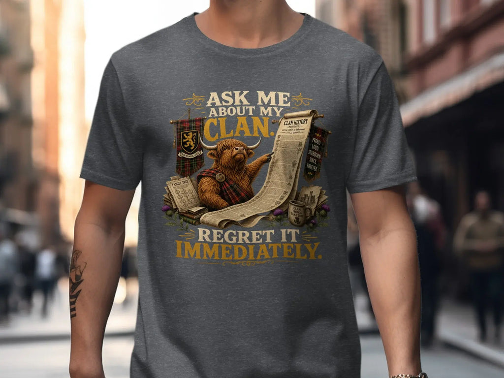 T-shirt with highland cow and "Ask me about my clan" text.