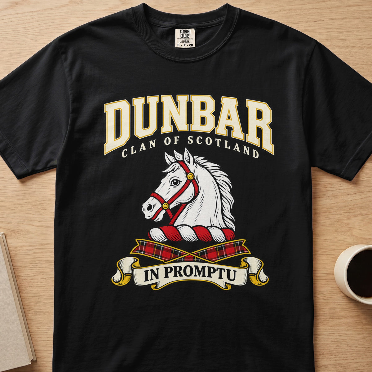 Dunbar clan crest with white horse head on a black Comfort Colors T-shirt, front view