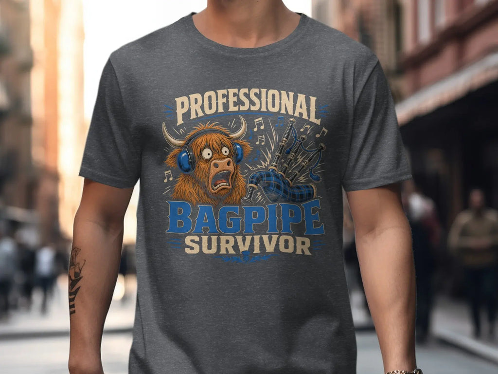 T-shirt with a Highland cow wearing headphones and bagpipes, reading "PROFESSIONAL BAGPIPE SURVIVOR".