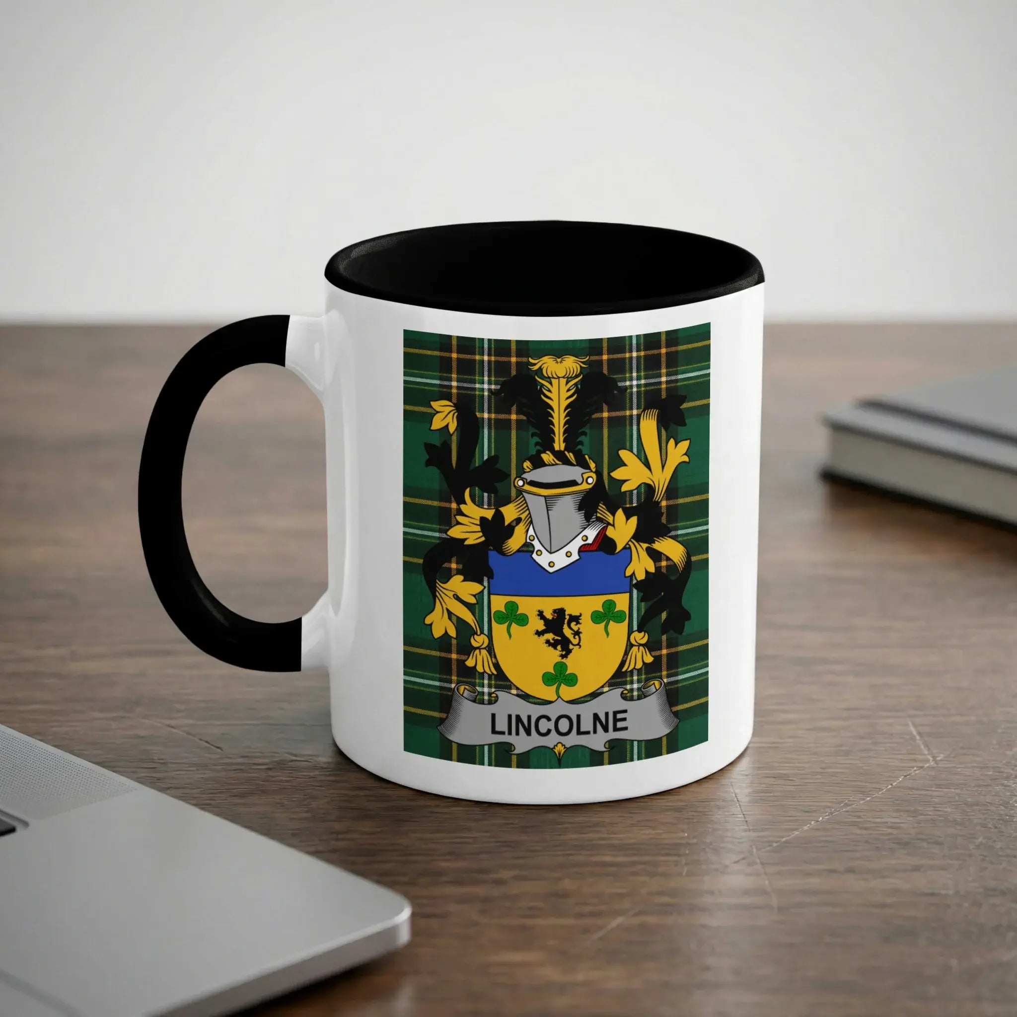 White mug with black rim and handle displaying a coat of arms with "LINCOLNE" banner.