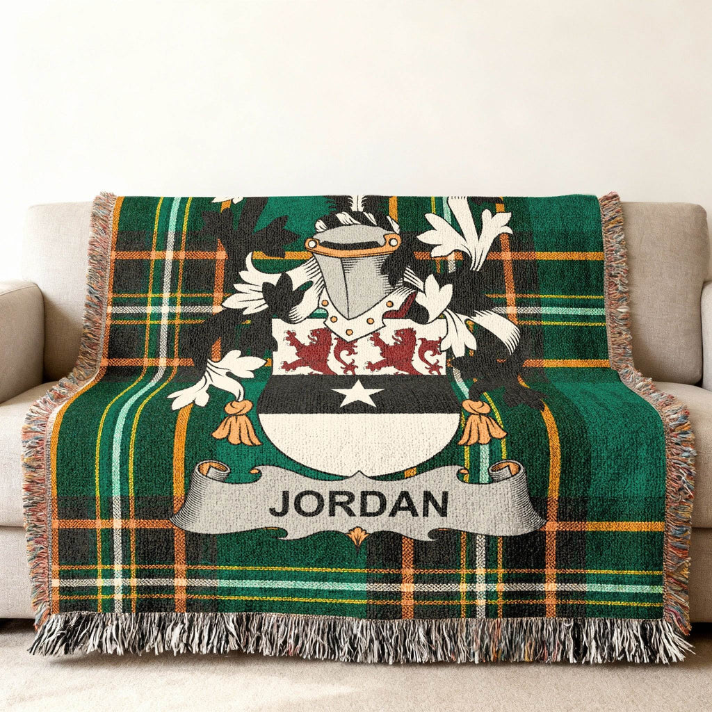 Woven tartan throw blanket with the Jordan family crest.