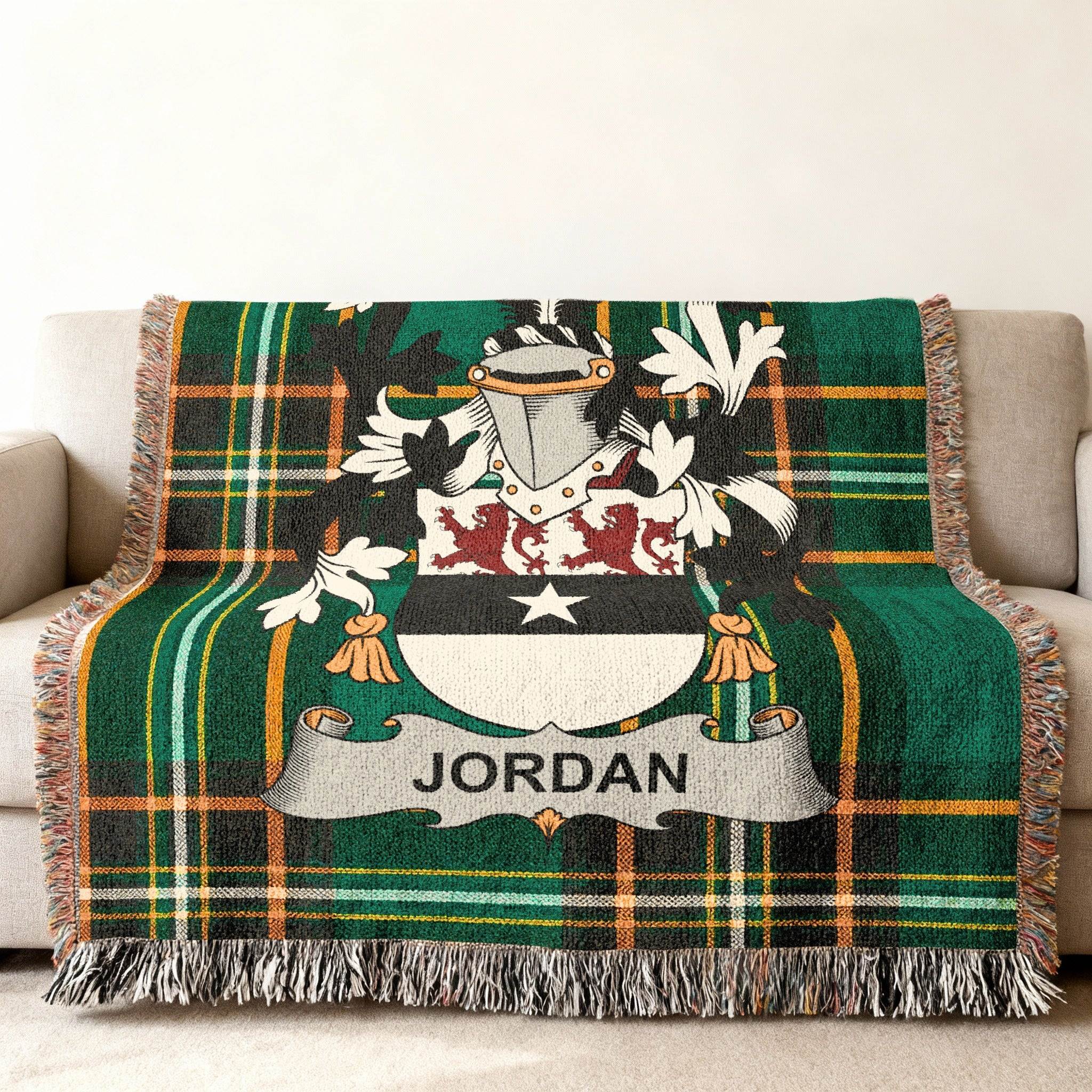 Woven tartan throw blanket with the Jordan family crest.