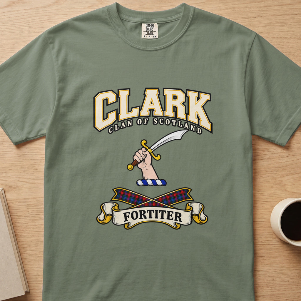 Clark clan T-shirt in sage green, front view with hand holding a curved sword