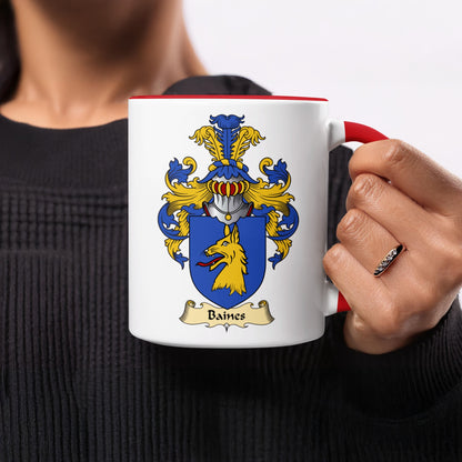 White mug with red handle featuring the Baines family crest.