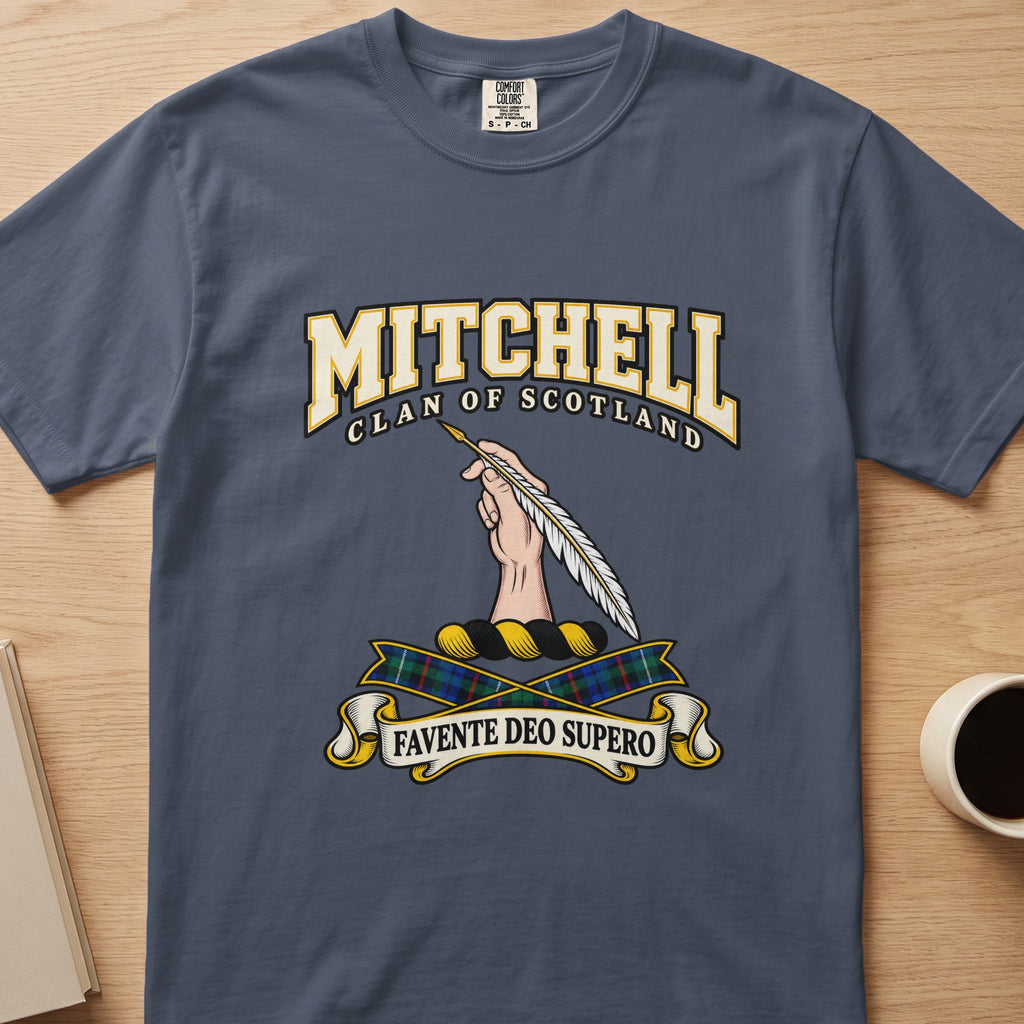 Mitchell clan T-shirt in slate blue, front view with hand holding long pale feathers