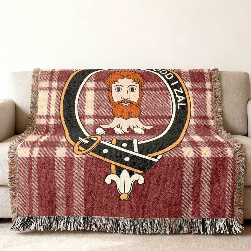 Menzies red and white clan tartan woven blanket draped — Vil God I Zal crest cotton throw