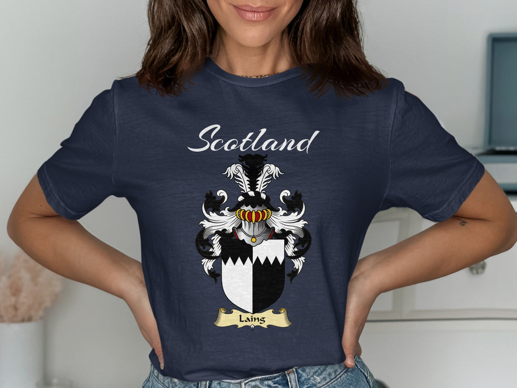 Model wearing a navy Laing T-shirt featuring black-and-white quarters with a jagged dividing line