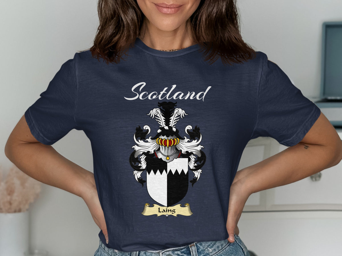 Model wearing a navy Laing T-shirt featuring black-and-white quarters with a jagged dividing line