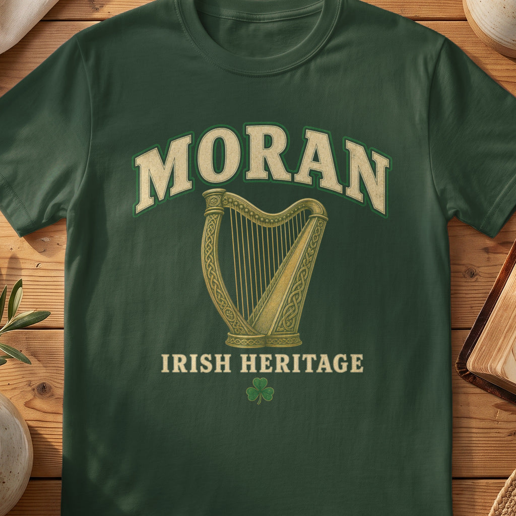 Moran Irish harp T-shirt in Forest Green, with cream surname lettering, a gold-toned harp, green shamrock and “Irish Heritage” text.