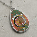 Bannatyne clan Scottish tartan necklace with clan crest and Latin motto on tartan background