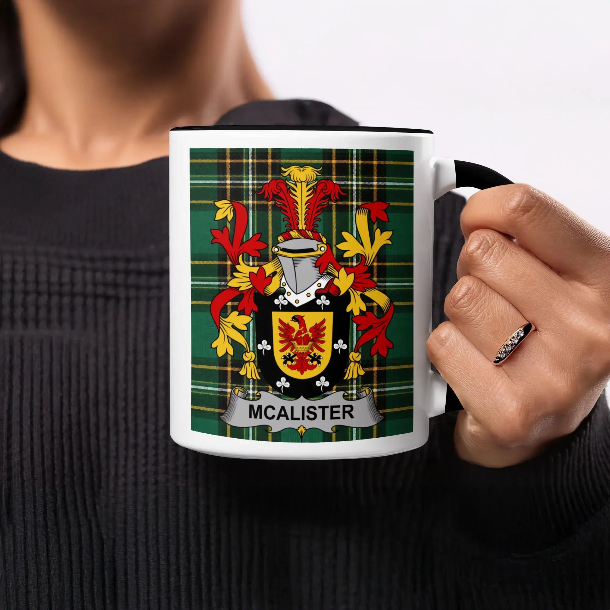 McAlister family crest on a black and white mug.