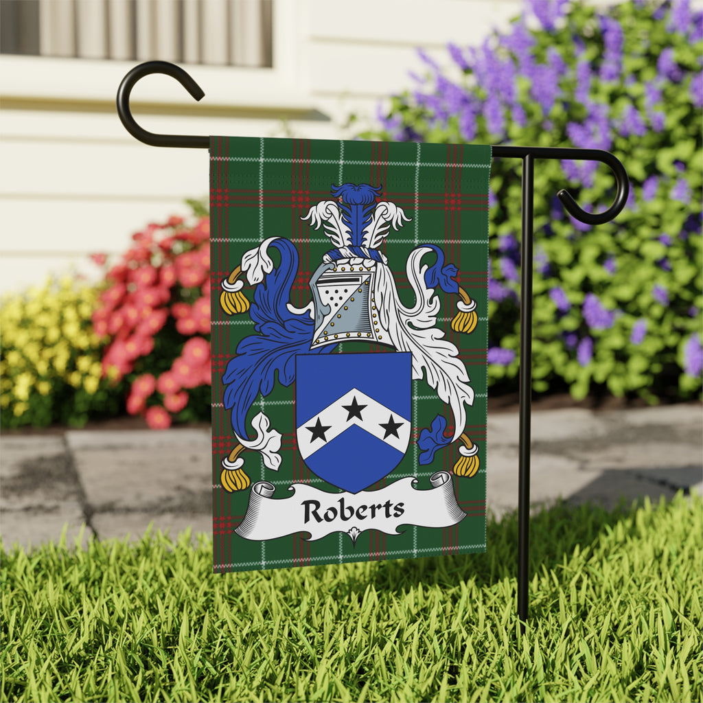 Roberts family crest flag displayed on a garden pole.