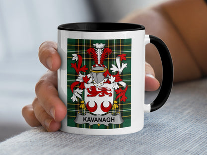 White mug with black rim featuring Kavanagh family crest on plaid background.