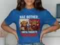 Blue t-shirt with two Highland cows, one calm with coffee, one angry.