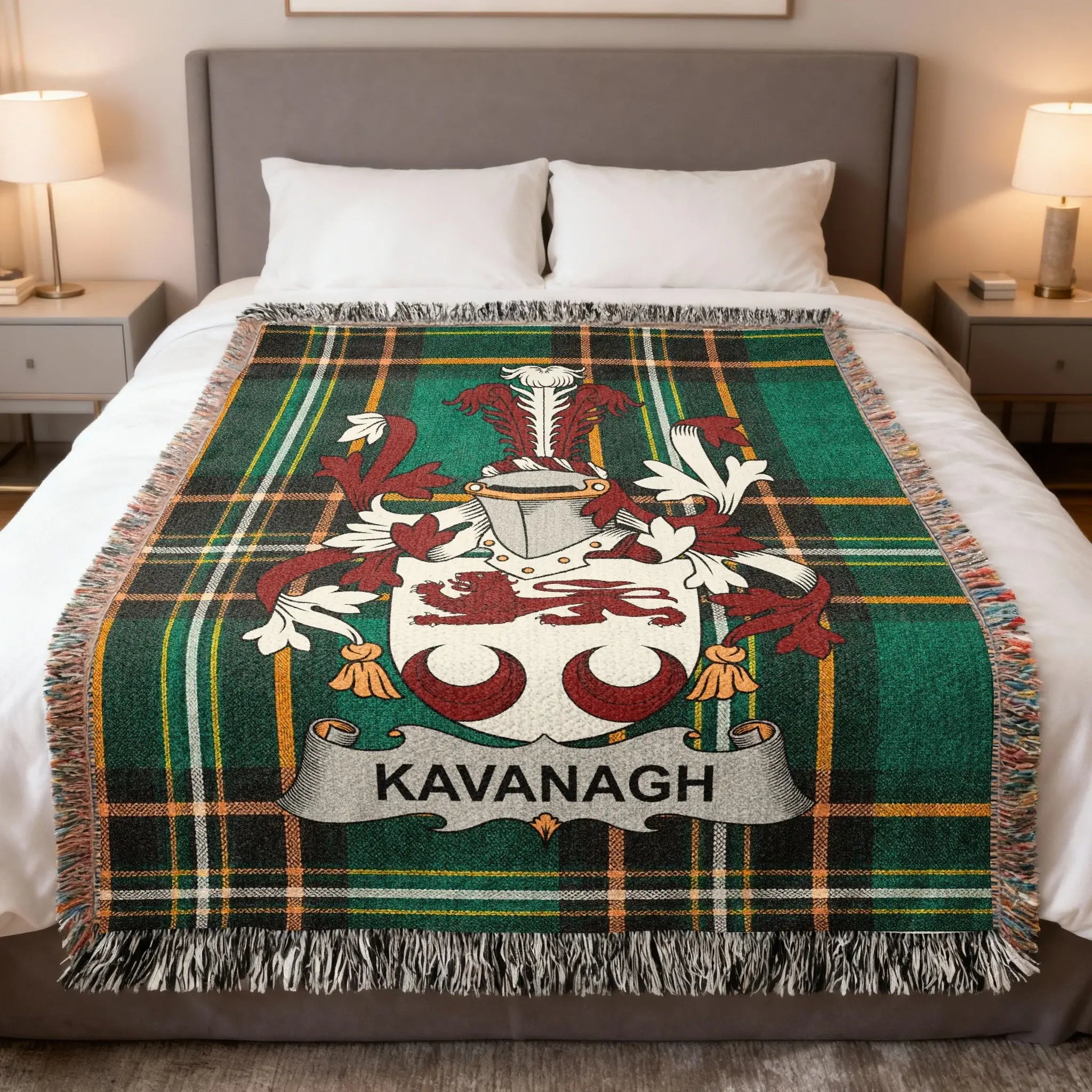 Tartan blanket with Kavanagh family crest draped over a bed.