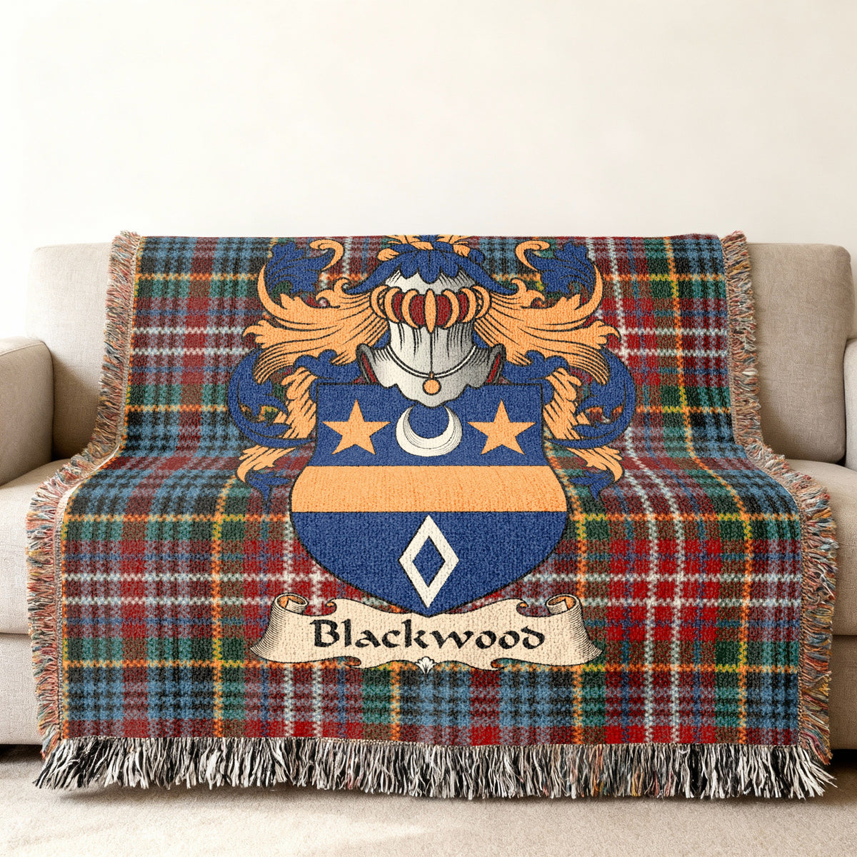 Blackwood Scottish family shield woven blanket on a Caledonia tartan background