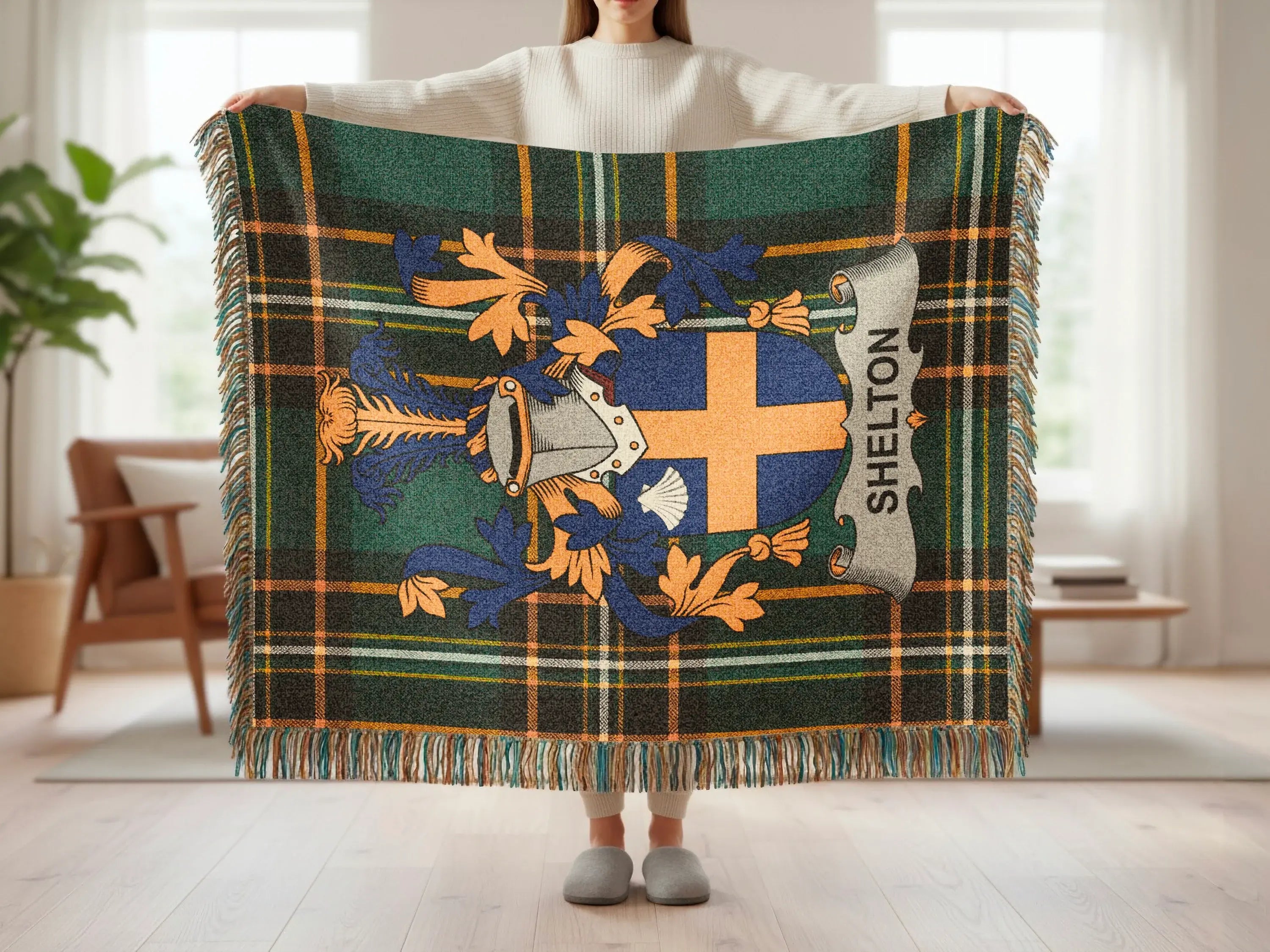 Green, blue, and gold plaid throw blanket with the Shelton family crest.
