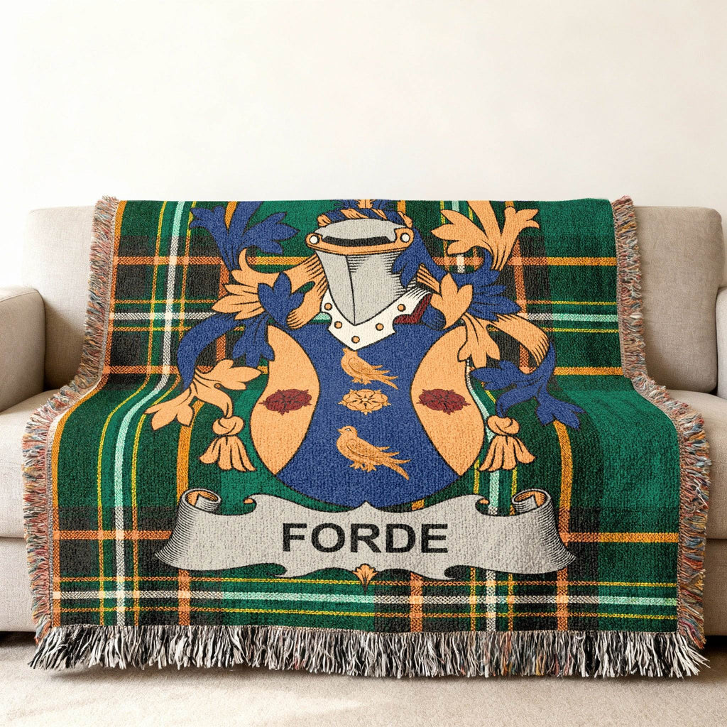 Woven tartan blanket with the Forde family crest.