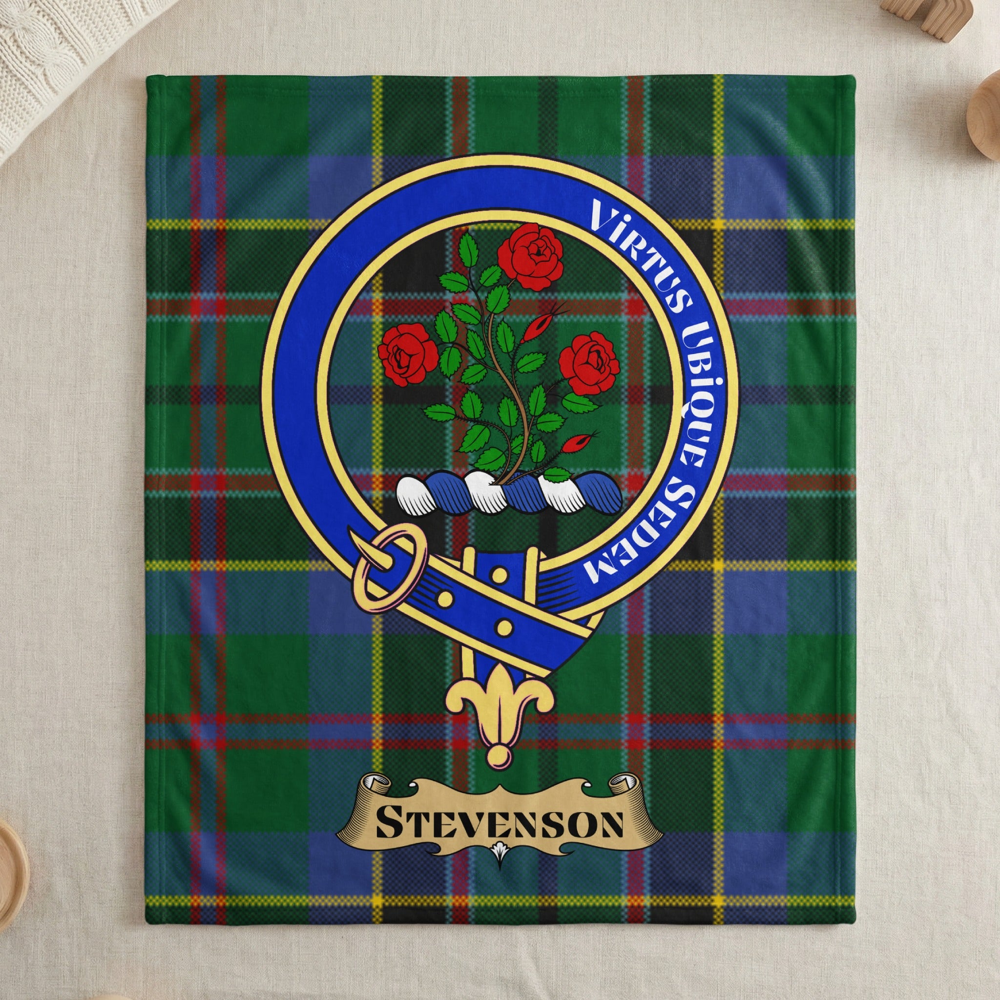 Stevenson clan tartan throw blanket with crest — draped display
