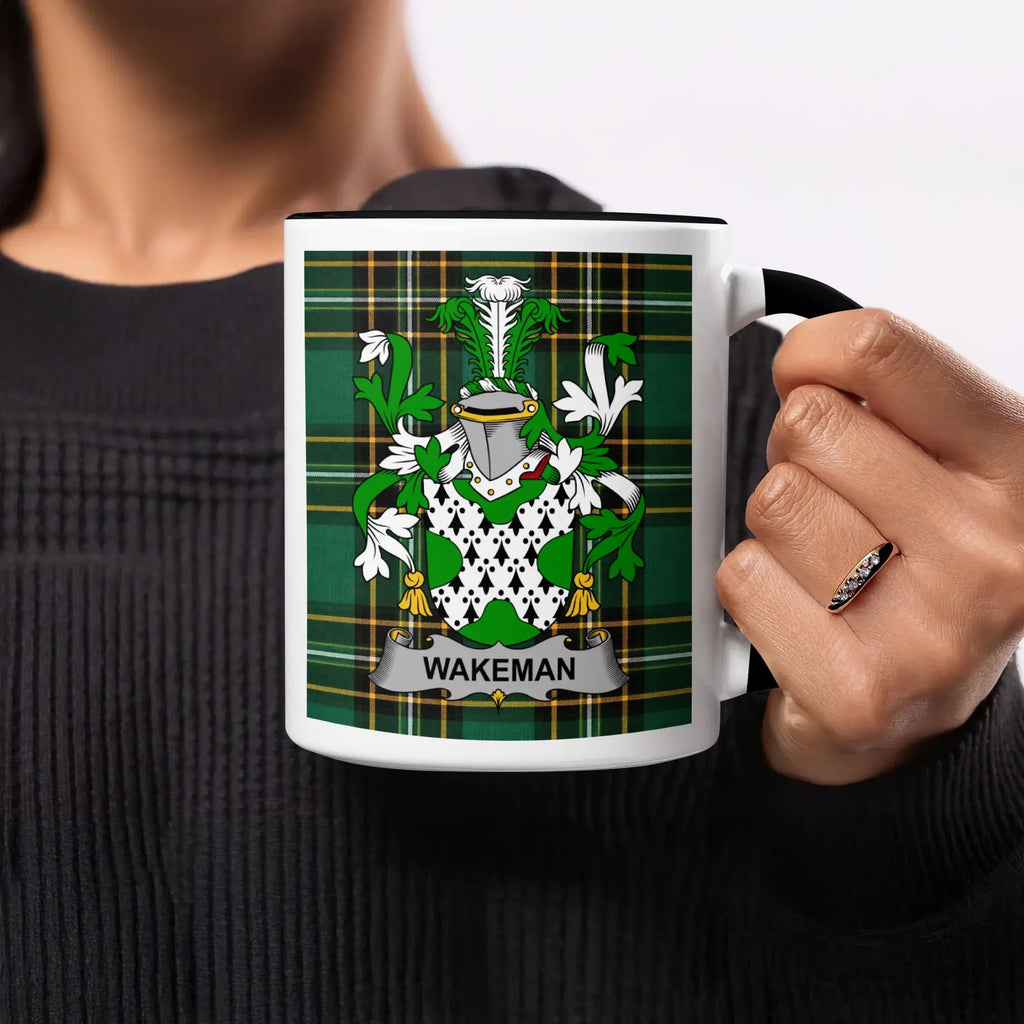 Mug with Wakeman family crest on a green tartan background.