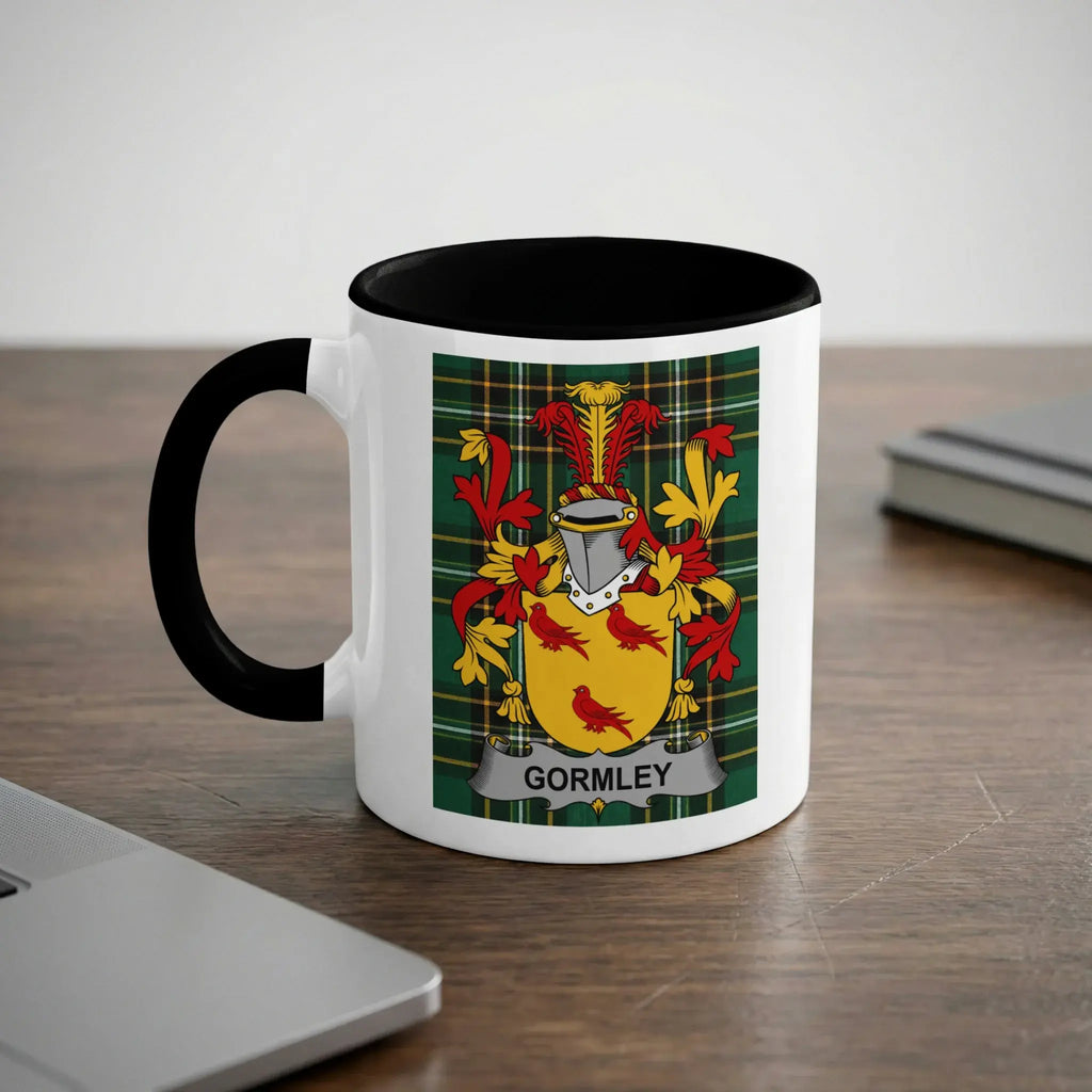 White mug with black rim featuring a Gormley family crest.