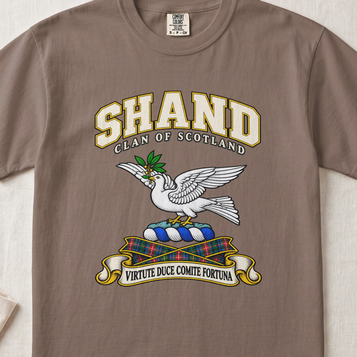 Shand Scottish clan T-shirt in Espresso, front view with a white dove in flight carrying a green branch and motto design.