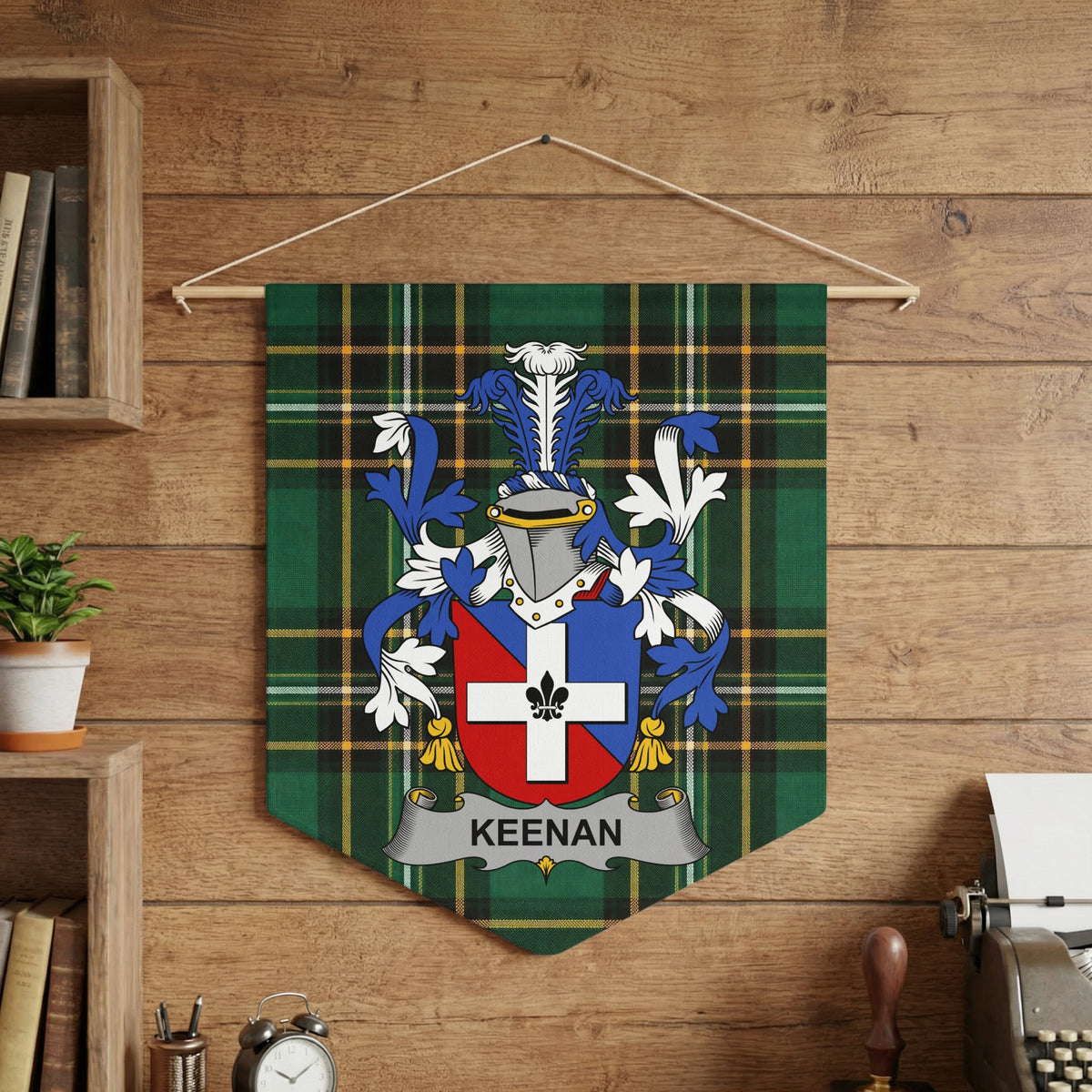 Keenan family crest banner with green plaid background hanging on a wooden wall.