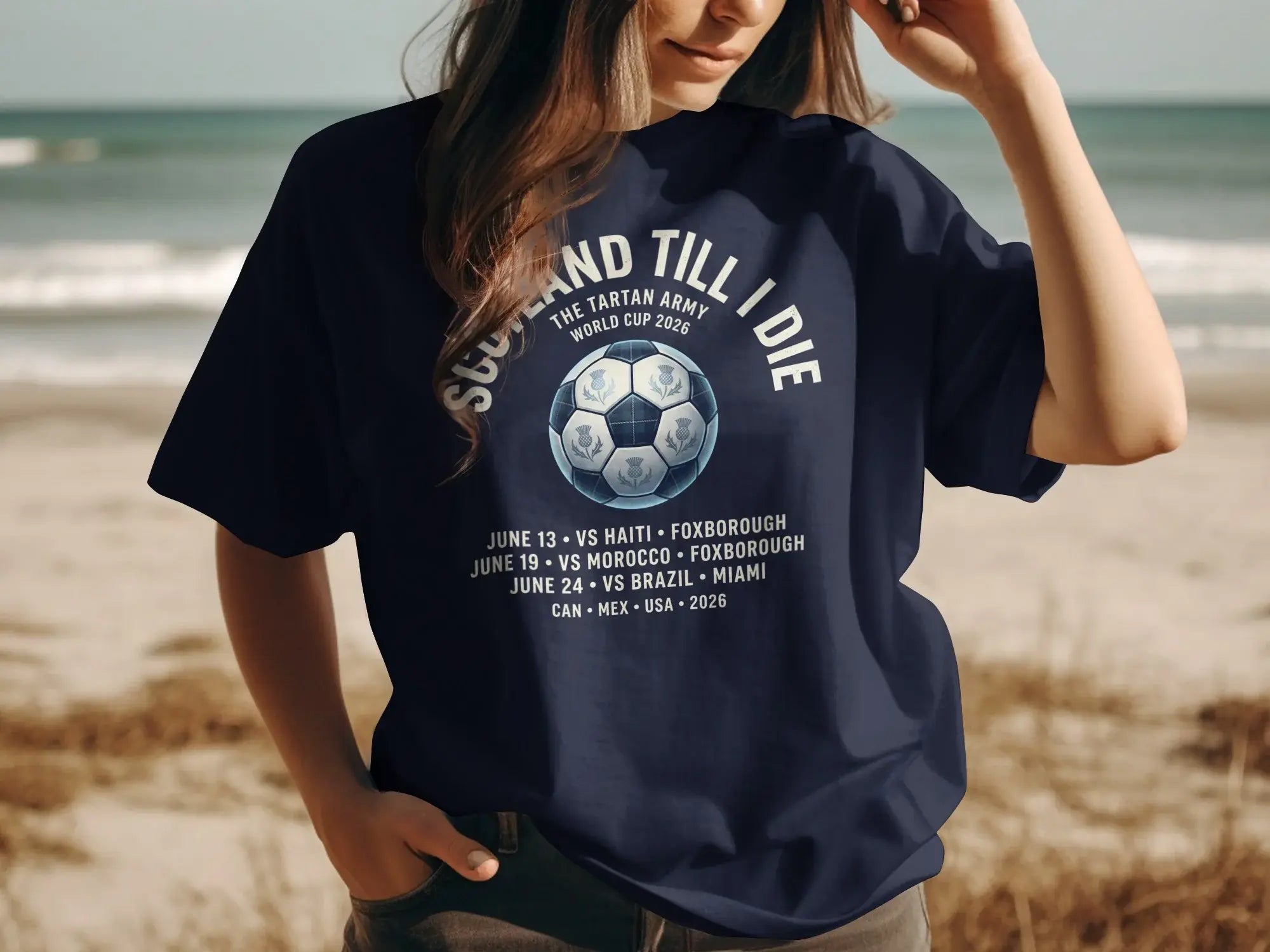 Navy t-shirt with "Scotland Till I Die" text and World Cup 2026 match schedule.