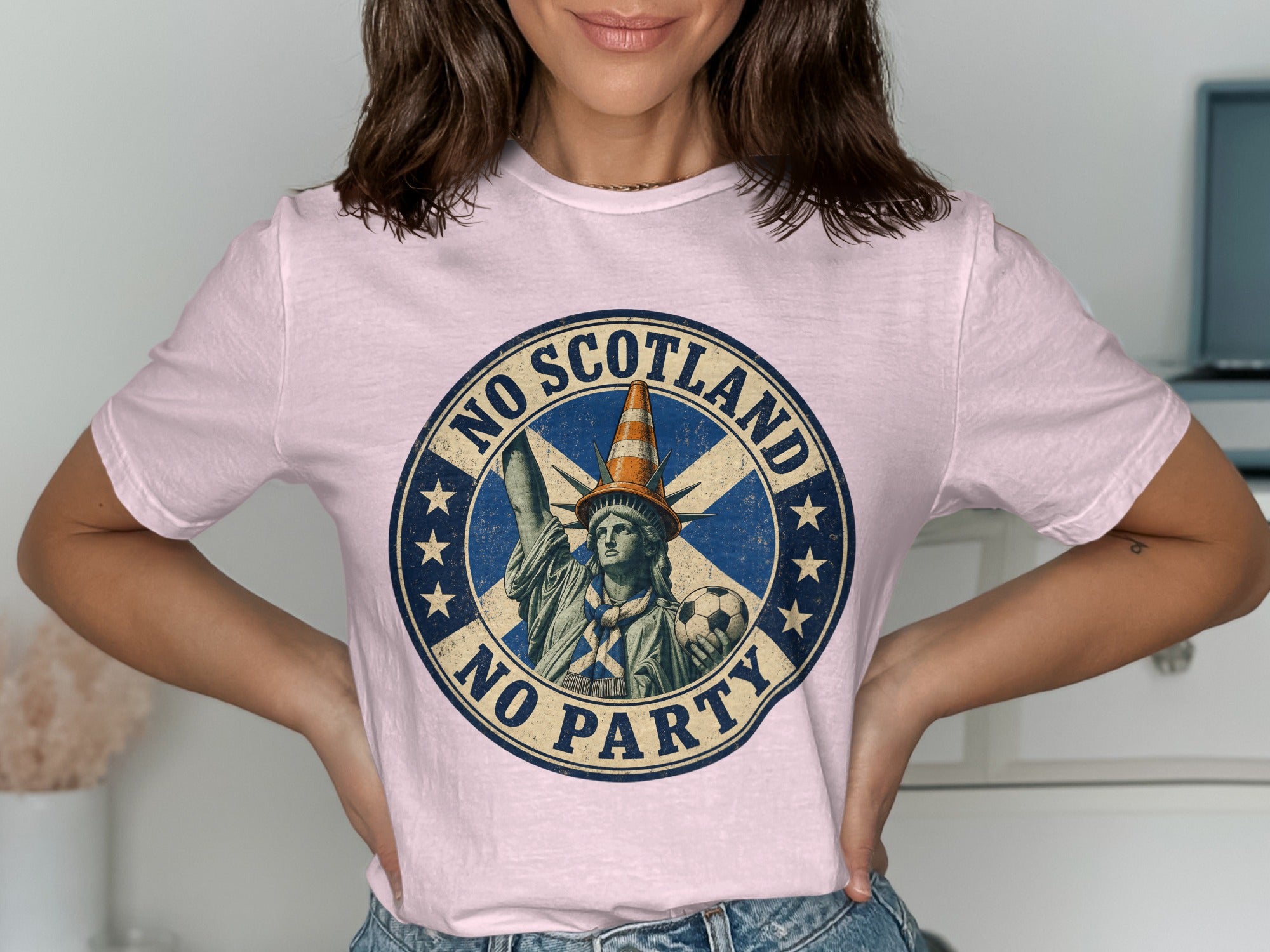 Statue of Liberty with a traffic cone hat, plaid scarf, holding a soccer ball, text "NO SCOTLAND NO PARTY"