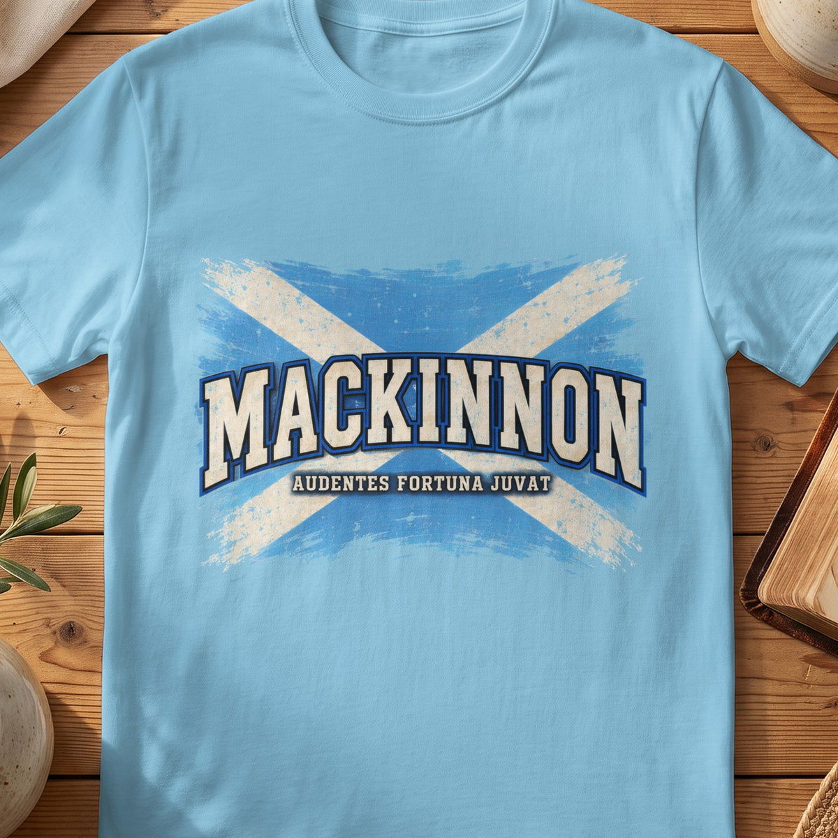 MacKinnon Scottish Saltire T-shirt in Sky, with distressed blue and cream flag and “Audentes Fortuna Juvat” lettering.
