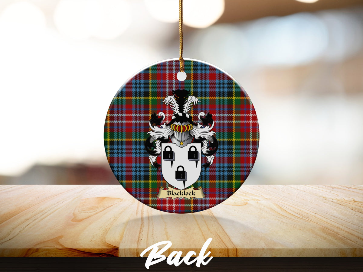 Round Blacklock Scottish clan ornament with family crest on a Caledonia tartan background