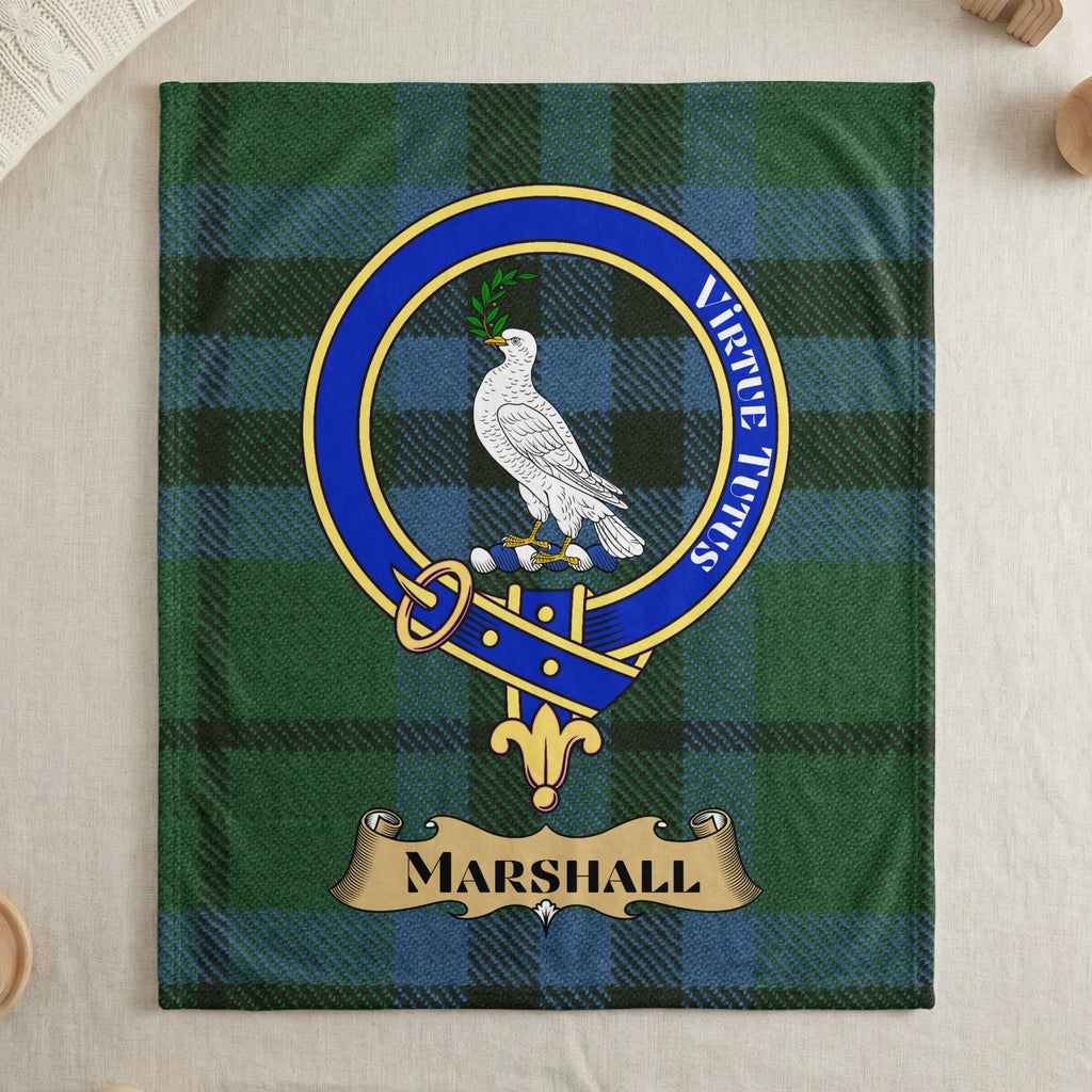 Marshall clan tartan throw blanket with crest and motto — draped display