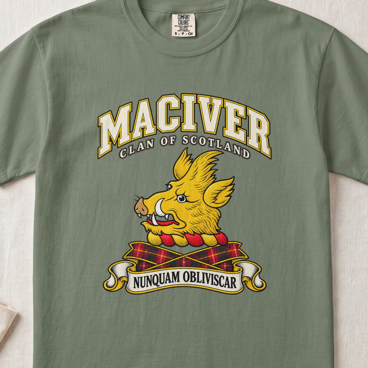 MacIver Scottish clan T-shirt in Moss, front view with a golden boar head and motto design.