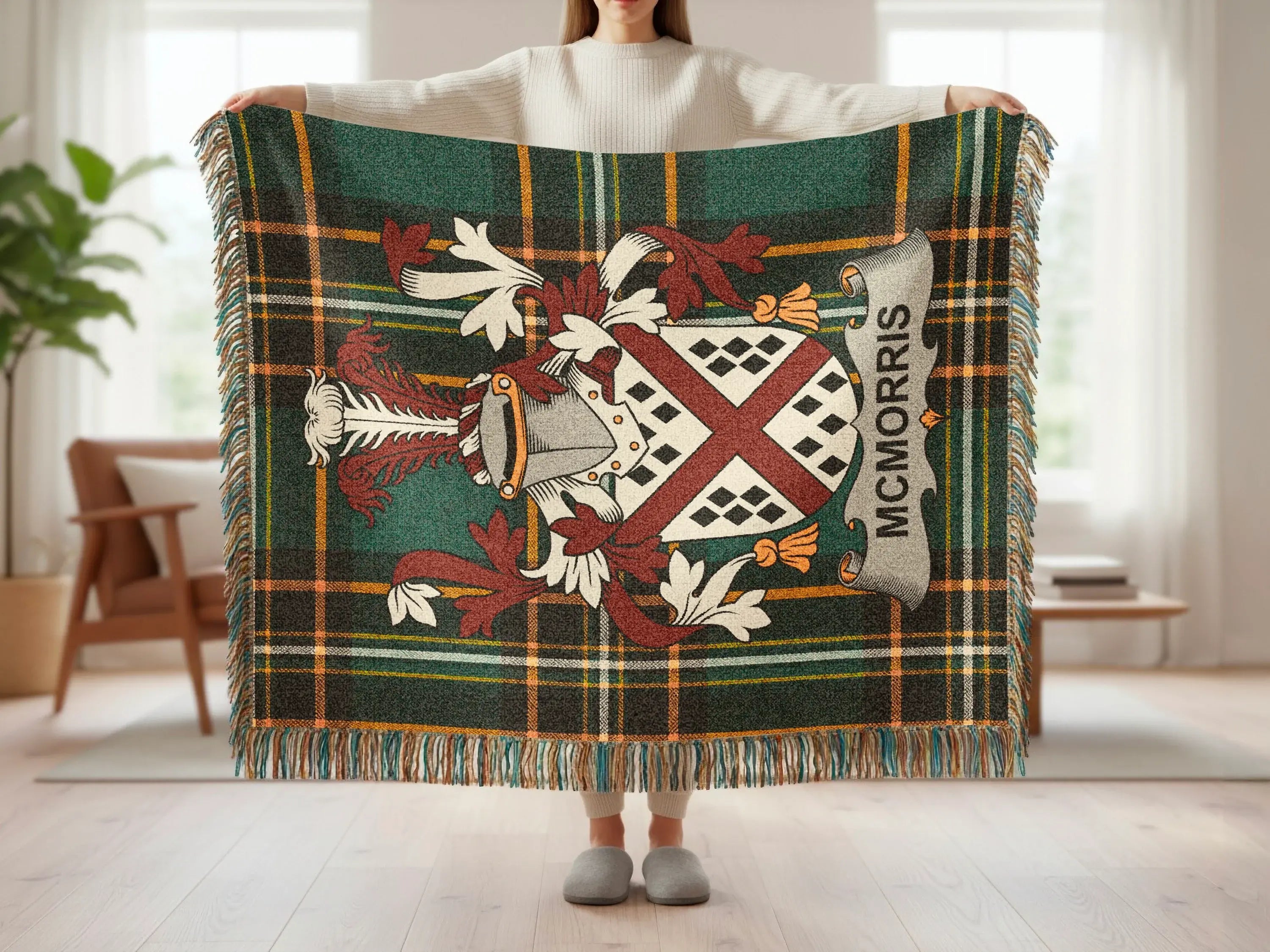 Tartan blanket with heraldic crest featuring MCMORRIS text.